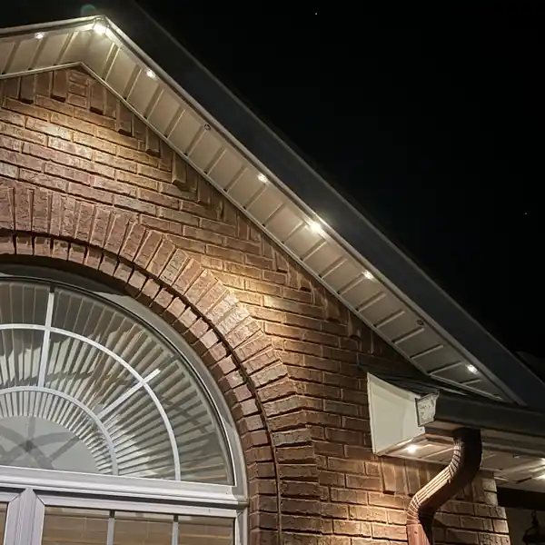 Close-up of permanent lights mounted under the soffit